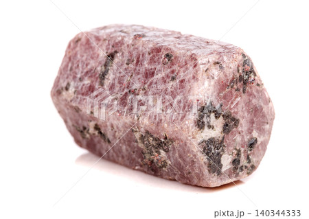 Macro mineral stone Ruby in the breed a white background Macro mineral stone Ruby in the breed a white background 140344333