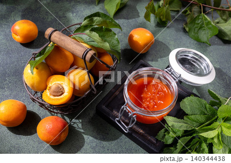 Ripe apricots and homemade jam for preserving fruit 140344438