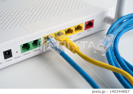 Ethernet cable with wireless router connect to internet service provider internet network. Ethernet cable with wireless router connect to internet service provider internet network. 140344667