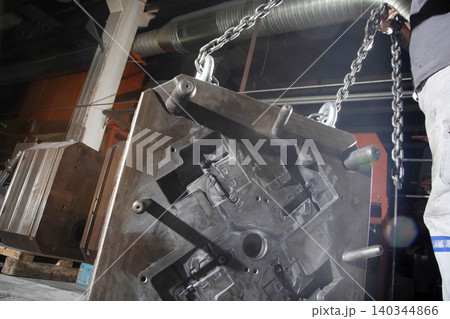 metal castings inside the factory metal castings inside the factory 140344866