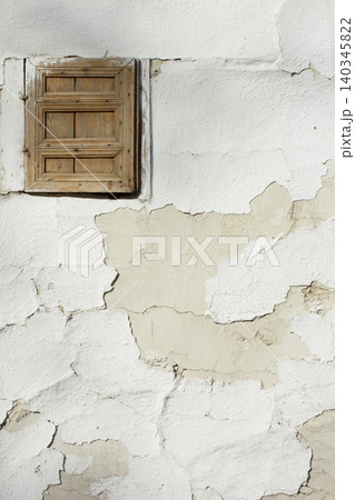 Old wall. Wooden shutter window Old wall. Wooden shutter window 140345822