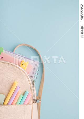 School backpack with pastel colored school supplies School backpack with pastel colored school supplies 140345952