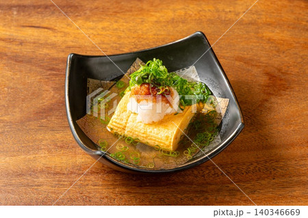 おでんだし巻き 出汁をたっぷり含んだ玉子焼き おでんだし巻き 出汁をたっぷり含んだ玉子焼き 140346669