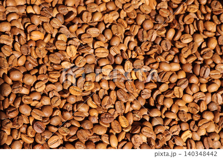 Roasted Coffee beans close up 140348442