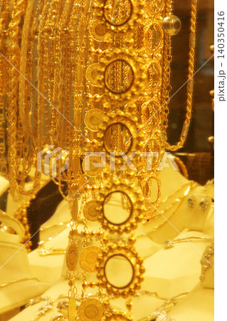 gold in jewelery shop window gold in jewelery shop window 140350416