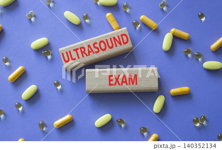 Ultrasound Exam symbol. Concept word Ultrasound Exam on wooden blocks. Beautiful purple background with pills. Medicine and Ultrasound Exam. Copy space Ultrasound Exam symbol. Concept word Ultrasound Exam on wooden blocks. Beautiful purple background with pills. Medicine and Ultrasound Exam. Copy space 140352134