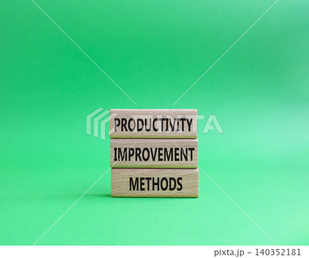 Productivity improvement methods symbol. Concept word Productivity improvement methods on wooden blocks. Beautiful green background. Business and Productivity improvement methods. Copy space Productivity improvement methods symbol. Concept word Productivity improvement methods on wooden blocks. Beautiful green background. Business and Productivity improvement methods. Copy space 140352181