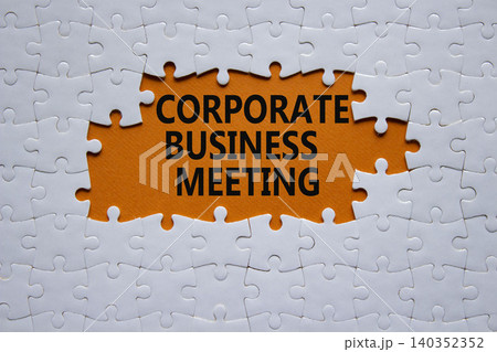 Corporate Business Meeting symbol. White puzzle with words Corporate Business Meeting. Beautiful orange background. Business concept. Copy space. 140352352