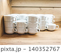 Stack of white ceramic coffee cups 140352767