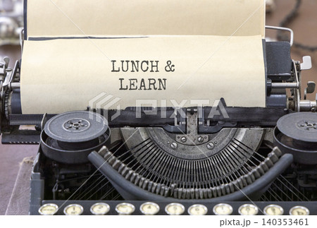 Lunch and learn symbol. Concept words Lunch and learn typed on beautiful old retro typewriter. Beautiful white paper background. Business, educational and lunch and learn concept. Copy space. Lunch and learn symbol. Concept words Lunch and learn typed on beautiful old retro typewriter. Beautiful white paper background. Business, educational and lunch and learn concept. Copy space. 140353461