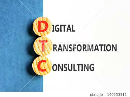 DTC digital transformation consulting symbol. Concept words DTC digital transformation consulting on beautiful wooden circles. Beautiful white blue background. Business DTC concept. Copy space. 140353515