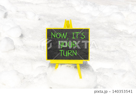Now it's your turn words symbol. Concept words Now it's your turn on beautiful black blackboard. Beautiful white snow background. Business Now it's your turn motivational support concept. Copy space. Now it's your turn words symbol. Concept words Now it's your turn on beautiful black blackboard. Beautiful white snow background. Business Now it's your turn motivational support concept. Copy space. 140353541