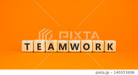 Teamwork word symbol. Concept word Teamwork on beautiful wooden blocks. Beautiful orange background. Business support help teamwork word concept. Copy space. Teamwork word symbol. Concept word Teamwork on beautiful wooden blocks. Beautiful orange background. Business support help teamwork word concept. Copy space. 140353696