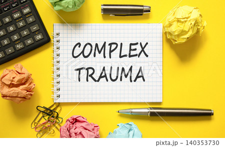 Complex trauma words symbol. Concept words Complex trauma on beautiful white note. Beautiful yellow background. Black pen. Black calculator. Psychological complex trauma support concept. Copy space. Complex trauma words symbol. Concept words Complex trauma on beautiful white note. Beautiful yellow background. Black pen. Black calculator. Psychological complex trauma support concept. Copy space. 140353730