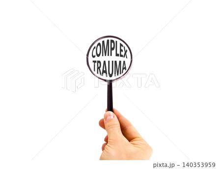 Complex trauma words symbol. Concept words Complex trauma on beautiful magnifying glass. Beautiful white background. Psychologist hand. Psychological complex trauma support concept. Copy space. Complex trauma words symbol. Concept words Complex trauma on beautiful magnifying glass. Beautiful white background. Psychologist hand. Psychological complex trauma support concept. Copy space. 140353959