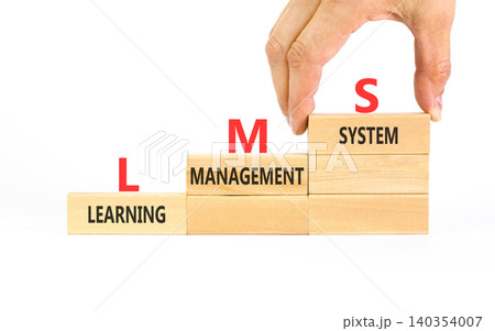 LMS learning management system symbol. Concept words LMS learning management system on beautiful wooden blocks. Beautiful white background. Business LMS learning management system concept. Copy space LMS learning management system symbol. Concept words LMS learning management system on beautiful wooden blocks. Beautiful white background. Business LMS learning management system concept. Copy space 140354007