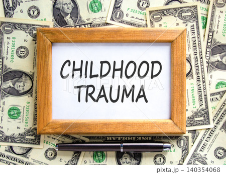 Childhood trauma words symbol. Concept words Childhood trauma on beautiful picture frame. Beautiful dollar bills background. Dollar bills. Psychological childhood trauma support concept. Copy space. Childhood trauma words symbol. Concept words Childhood trauma on beautiful picture frame. Beautiful dollar bills background. Dollar bills. Psychological childhood trauma support concept. Copy space. 140354068