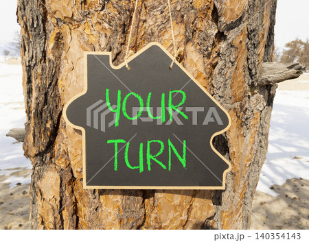 Your turn words symbol. Concept words Your turn on beautiful black blackboard. Beautiful old tree background. Business your turn motivational support concept. Copy space. Your turn words symbol. Concept words Your turn on beautiful black blackboard. Beautiful old tree background. Business your turn motivational support concept. Copy space. 140354143