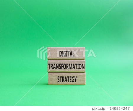 Digital Transformation Strategy symbol. Concept word Digital Transformation Strategy on wooden blocks. Beautiful orange background. Business and Digital Transformation Strategy. Copy space Digital Transformation Strategy symbol. Concept word Digital Transformation Strategy on wooden blocks. Beautiful orange background. Business and Digital Transformation Strategy. Copy space 140354247