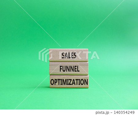 Sales Funnel Optimization symbol. Concept word Sales Funnel Optimization on wooden blocks. Beautiful green background. Business and Sales Funnel Optimization. Copy space Sales Funnel Optimization symbol. Concept word Sales Funnel Optimization on wooden blocks. Beautiful green background. Business and Sales Funnel Optimization. Copy space 140354249