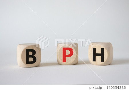 BPH - Benign Prostatic Hyperplasia symbol. Wooden cubes with word BPH. Beautiful white background. Medical and BPH concept. Copy space. BPH - Benign Prostatic Hyperplasia symbol. Wooden cubes with word BPH. Beautiful white background. Medical and BPH concept. Copy space. 140354286