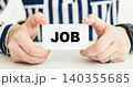 JOB. Woman holding a card with a message text written on it. 140355685
