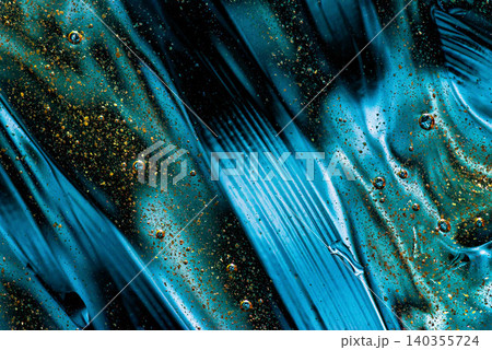 Abstract macro textures of mixed paint and liquid gold Abstract macro textures of mixed paint and liquid gold 140355724