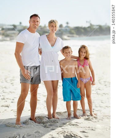 Parents, children and portrait on beach in summer for holiday on island or bonding, connection or vacation. Man, woman and siblings with face in Florida together or outdoor happiness, travel or relax 140355847