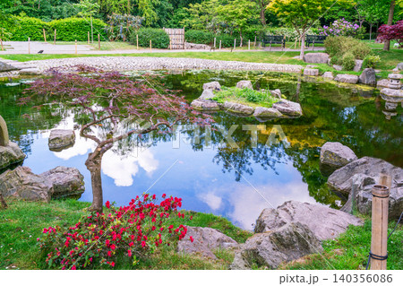 Scenic landscape view of Kyoto Garden in Holland Park, West London, during a sunny spring day. 140356086