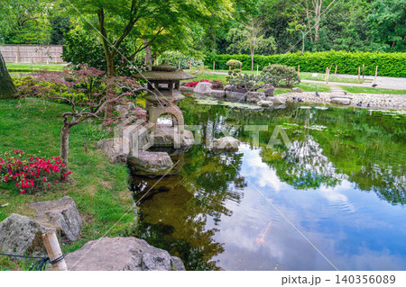 Scenic landscape view of Kyoto Garden in Holland Park, West London, during a sunny spring day. 140356089