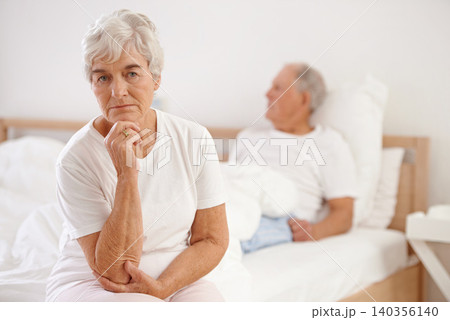 Senior, couple and sad in bedroom with conflict, ignore and crisis in marriage for mental health or retirement. Elderly, woman or man with fight, argument or divorce on bed in home with disagreement Senior, couple and sad in bedroom with conflict, ignore and crisis in marriage for mental health or retirement. Elderly, woman or man with fight, argument or divorce on bed in home with disagreement 140356140