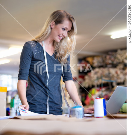 Business, woman and designer with laptop for fashion, fabric research or web design concept at work. Creative, person or happy tailor with technology for online pattern, inspiration or sewing textile 140356260