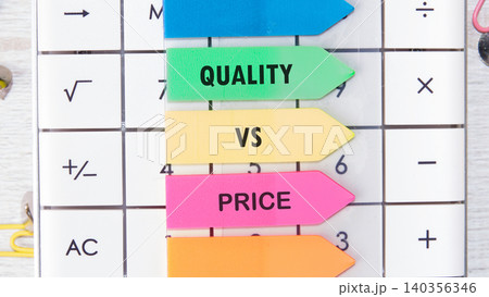 Colorful arrows labeled quality and price stand prominently on a calculator, highlighting the important balance between value and cost in decision making 140356346