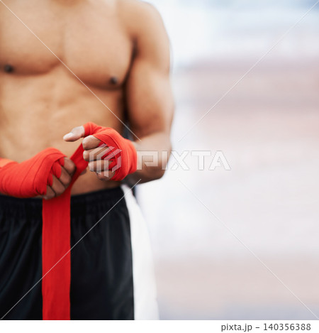 Man, hand and wrap for mma, protection and strength at fitness and workout studio with mockup. Person with strap, fist or fingers to bandage and protect for exercise, training or competitive fighting Man, hand and wrap for mma, protection and strength at fitness and workout studio with mockup. Person with strap, fist or fingers to bandage and protect for exercise, training or competitive fighting 140356388