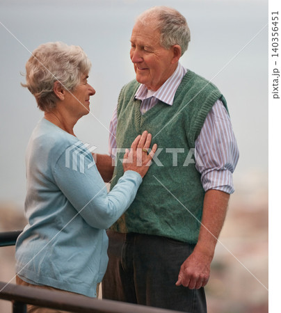 Love, smile and senior couple on balcony of home together with view of nature for romantic getaway. Marriage, anniversary or bonding with happy elderly man and woman outdoor on holiday or vacation Love, smile and senior couple on balcony of home together with view of nature for romantic getaway. Marriage, anniversary or bonding with happy elderly man and woman outdoor on holiday or vacation 140356451