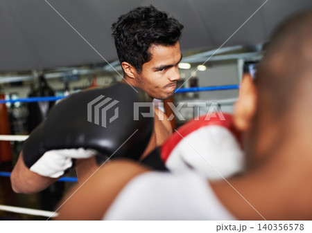 Boxer, man and fight in boxing ring for training, workout and confidence for performance with coach and fitness. Professional, athlete and exercise for competition, match and sport with endurance 140356578