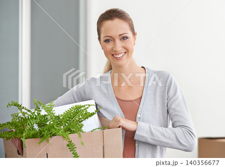 Portrait, new home and woman with boxes, smile and real estate with rental apartment and excited. Person, plant and girl with achievement and personal development with package and property on a loan 140356677