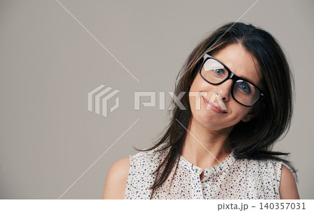 Glasses, fashion and portrait of woman on gray background for vision, eyesight and optometry. Optician, mockup space and face of isolated person with spectacles, prescription lens and frame in studio Glasses, fashion and portrait of woman on gray background for vision, eyesight and optometry. Optician, mockup space and face of isolated person with spectacles, prescription lens and frame in studio 140357031