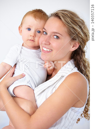 Happy mother, portrait and baby with love in care, trust or bonding together on holiday weekend at home. Face of mom or little toddler with smile for family, childhood or motherhood in relax at house Happy mother, portrait and baby with love in care, trust or bonding together on holiday weekend at home. Face of mom or little toddler with smile for family, childhood or motherhood in relax at house 140357116
