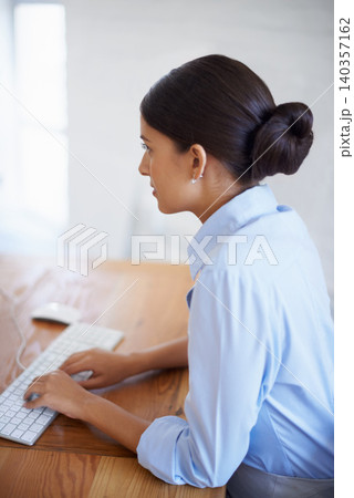 Professional, woman and typing at desk in office with computer as assistant in administration Business, clerk and secretary working on project, agenda or busy with keyboard on pc with confidence Professional, woman and typing at desk in office with computer as assistant in administration Business, clerk and secretary working on project, agenda or busy with keyboard on pc with confidence 140357162