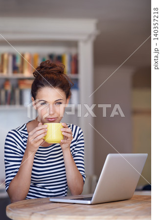 Thinking, coffee and woman in home office with laptop, idea and online job for business networking. Freelance, remote work and girl at table with computer for communication, reflection and relax. Thinking, coffee and woman in home office with laptop, idea and online job for business networking. Freelance, remote work and girl at table with computer for communication, reflection and relax. 140357218