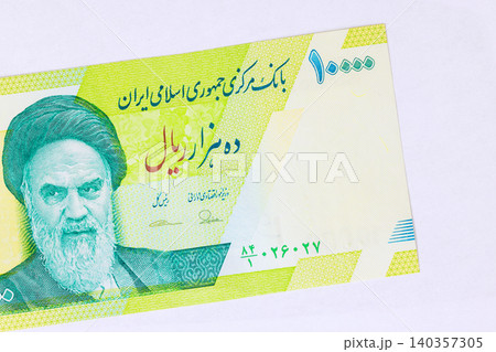 Iran 10000 Rial cash banknote Ayatollah Khomeini, an iconic figure in Iranian history of Islamic Republic. Iran 10000 Rial cash banknote Ayatollah Khomeini, an iconic figure in Iranian history of Islamic Republic. 140357305