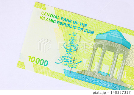 10000 Rial IRR cash banknote from Iran issued by Central Bank of Islamic Republic of Iran. 10000 Rial IRR cash banknote from Iran issued by Central Bank of Islamic Republic of Iran. 140357317