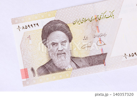 Iranian 10000 Rial banknote featuring Ayatollah Khomeini, national currency of Iran symbol of Islamic Republic. 140357320