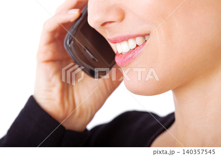 Mouth, closeup and person with phone call for communication, contact and virtual chat. Cellphone, conversation and woman smile for easy connection with technology in studio or white background 140357545