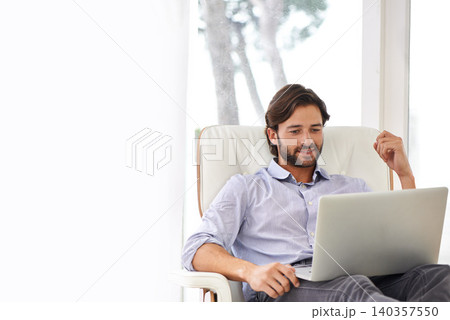 Businessman, relax and sofa with laptop online for remote work, living room and home office for freelance job. Male person, social media and browsing or research on computer, couch and smile 140357550