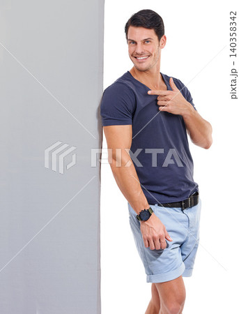 Man, pointing at poster mockup and advertising sign, portrait with announcement or news on white background. Billboard, banner and signage with information, communication and about us promotion Man, pointing at poster mockup and advertising sign, portrait with announcement or news on white background. Billboard, banner and signage with information, communication and about us promotion 140358342