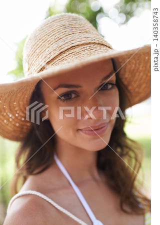 Park, smile and portrait of woman with sun hat for summer vacation, holiday or picnic in sunshine. Nature, relax and closeup of face with person in forest for travel, adventure and outdoor enjoyment Park, smile and portrait of woman with sun hat for summer vacation, holiday or picnic in sunshine. Nature, relax and closeup of face with person in forest for travel, adventure and outdoor enjoyment 140358743