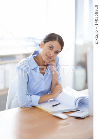 Business woman, portrait and desk with documents at office on break for accounting or finance. Young female person, accountant or employee with smile in relax for paperwork or audit at the workplace Business woman, portrait and desk with documents at office on break for accounting or finance. Young female person, accountant or employee with smile in relax for paperwork or audit at the workplace 140358919
