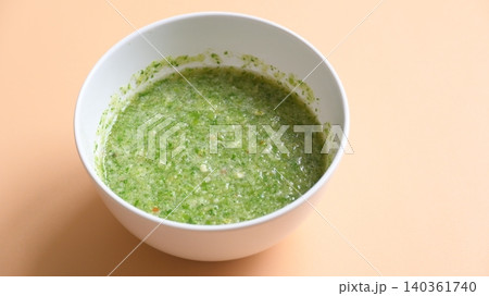 Thai spicy seafood dipping sauce on white bowl Thai spicy seafood dipping sauce on white bowl 140361740